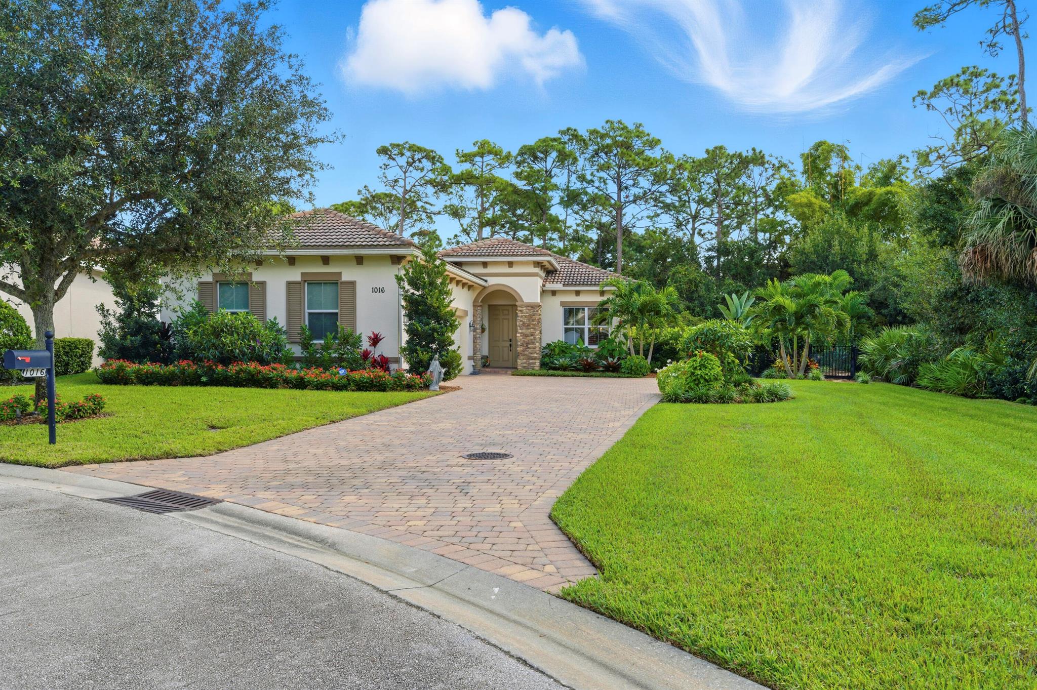 Welcome to Savannah Estates (aka Venetian Village), a gated community of just 50 homes. This well-maintained CBS 3BR/2.5BA pool home offers a 3-car air-conditioned garage with epoxy flooring and is ideally located on a cul-de-sac. Built in 2013, features include impact windows, crown molding, tiled common areas, and refreshed 2024 landscaping with remote irrigation. The driveway, patio, and pool deck are covered with brick-pavers. Enjoy a screened lanai overlooking the heated saltwater pool and spa with lighted waterfalls (2024) --perfect for entertaining or relaxing in style. A kitchen window was added for more natural light and a pool view. Convenient to I-95, schools, shops, medical services dining, parks, beaches, and golf. PBI is approx 45 minutes away. Up to three pets welcome.
