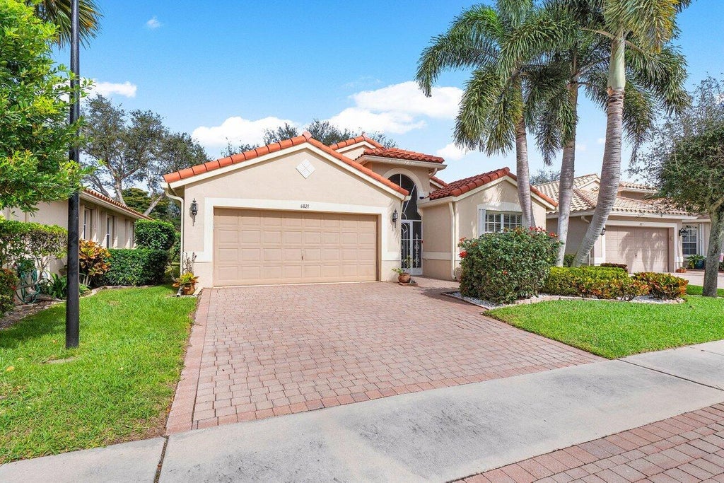 Photo of 6821 Castlemaine Avenue, Boynton Beach, FL 33437 (MLS # R10953120)