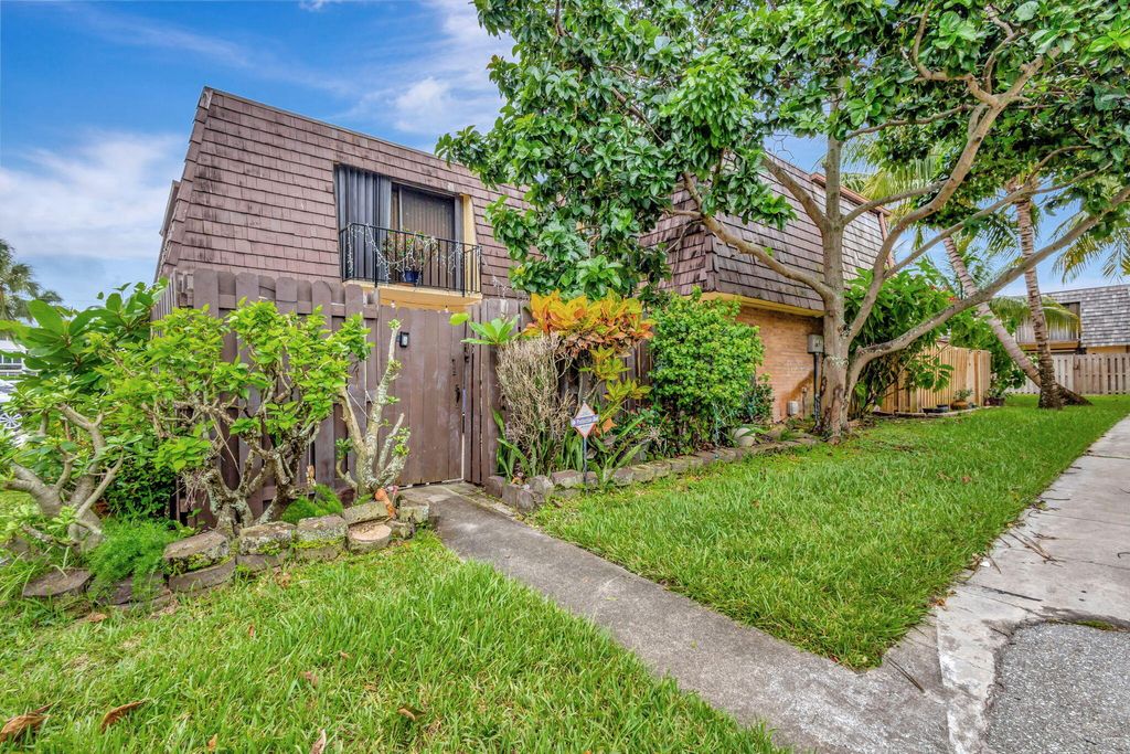 Photo of 247 Lake Arbor Drive, Palm Springs, FL 33461 (MLS # R11028716)