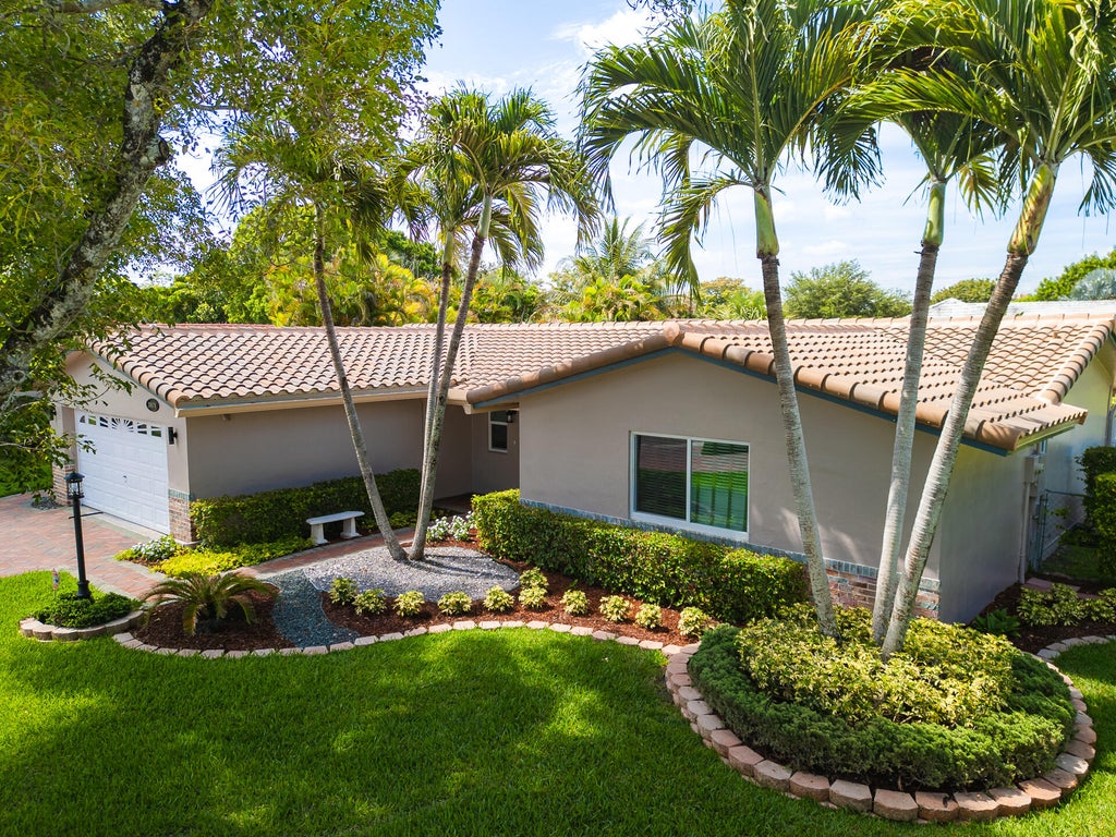 Photo of 10670 NW 42nd Drive, Coral Springs, FL 33065 (MLS # B26041731)