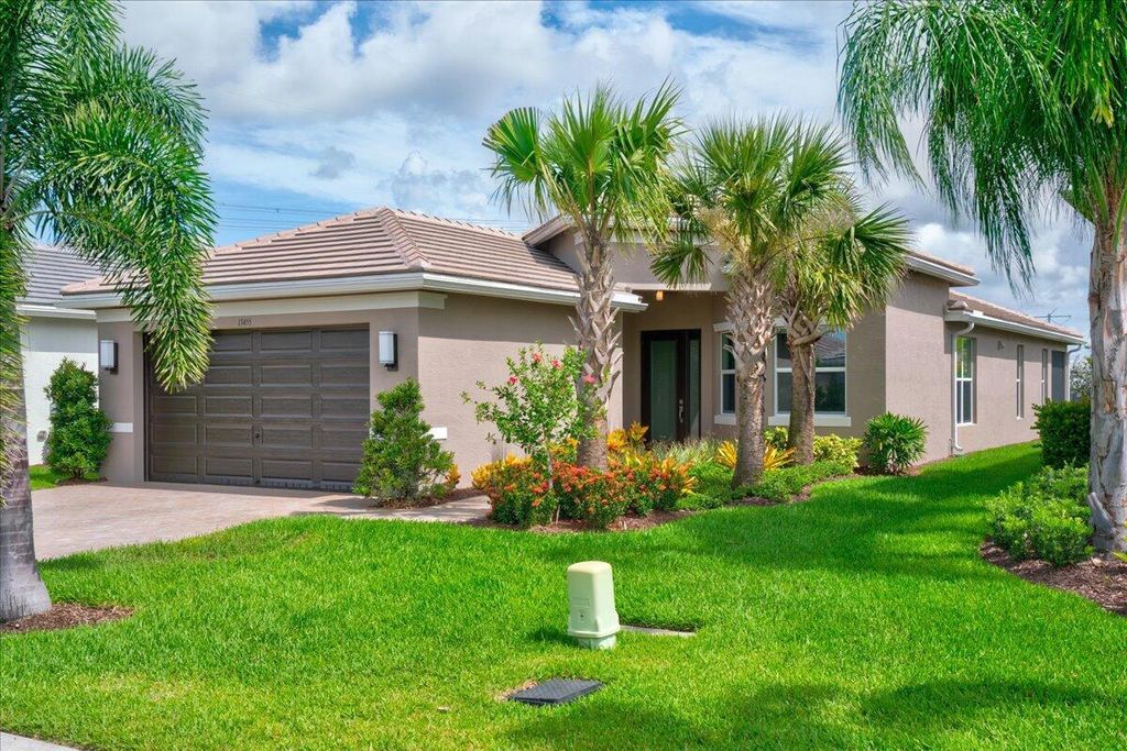 Photo of 13455 SW River Rock Road, Port Saint Lucie, FL 34987 (MLS # R11074320)