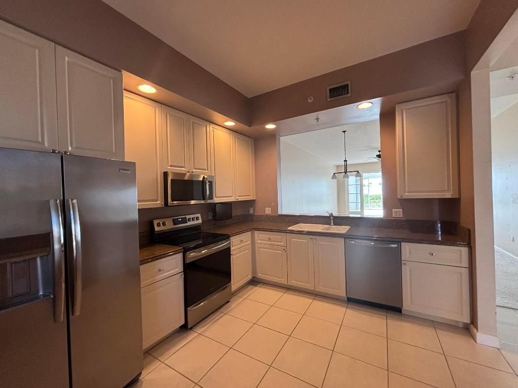 Photo of 27 Harbour Isle Drive W #102, Fort Pierce, FL 34949 (MLS # R11142636)