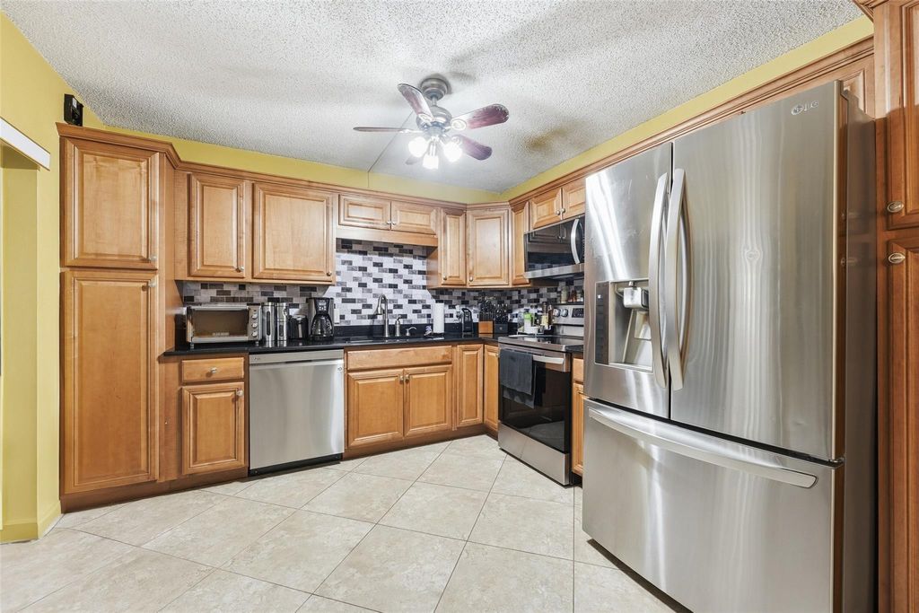 Photo of 1601 16th Terrace, Palm Beach Gardens, FL 33418 (MLS # F10552078)