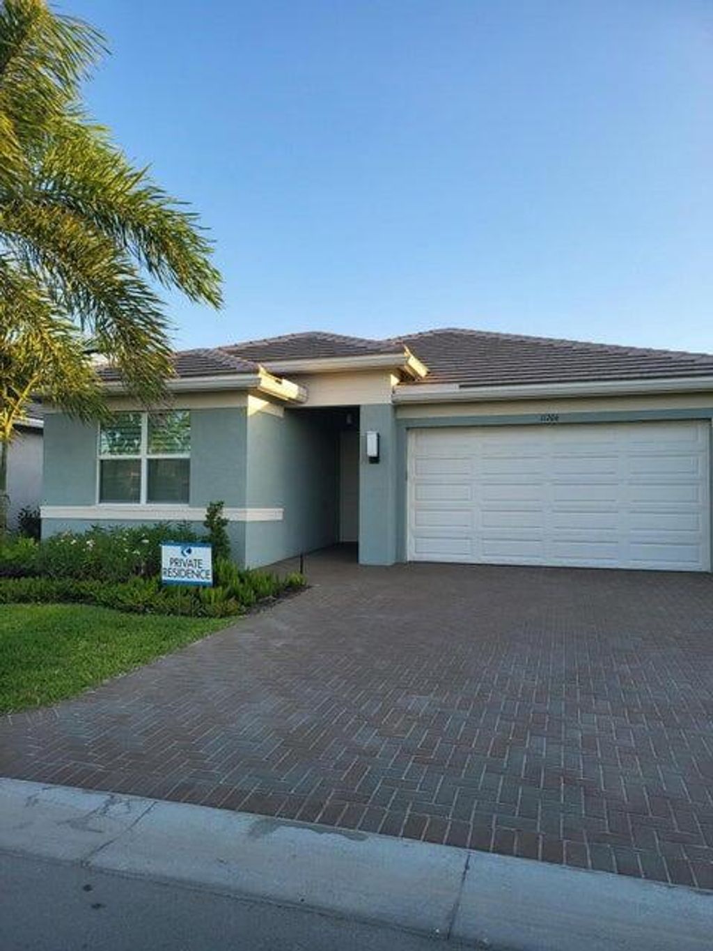 Photo of 11706 SW River Crossing Place, Port Saint Lucie, FL 34987 (MLS # R10931485)