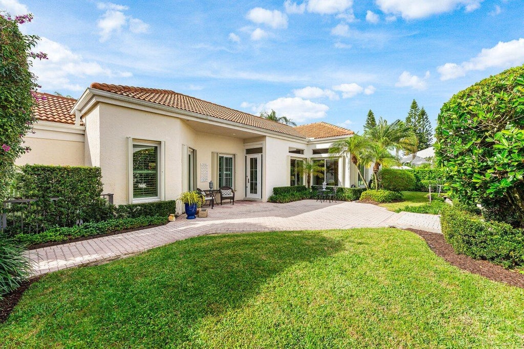 Photo of 116 Coral Cay Drive, Palm Beach Gardens, FL 33418 (MLS # R11149067)