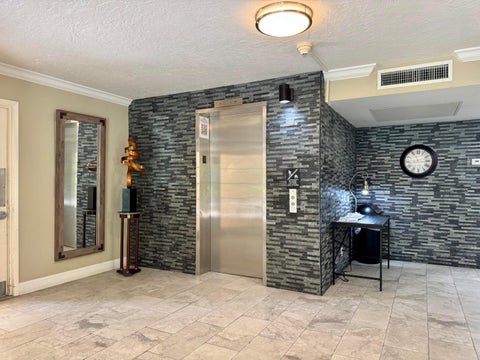 Tiny photo for 2601 S Course Drive #401, Pompano Beach, FL 33069 (MLS # B26047182)
