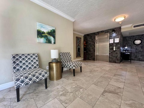 Tiny photo for 2601 S Course Drive #401, Pompano Beach, FL 33069 (MLS # B26047182)