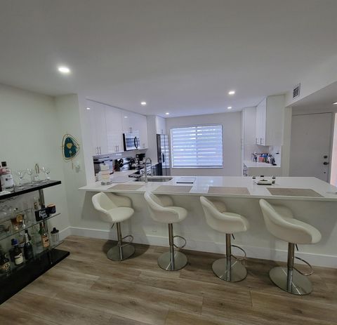 Photo of 11296 Green Lake Drive #104, Boynton Beach, FL 33437 (MLS # R11136674) Photo of 11296 Green Lake Drive #104, Boynton Beach, FL 33437 (MLS # R11136674)