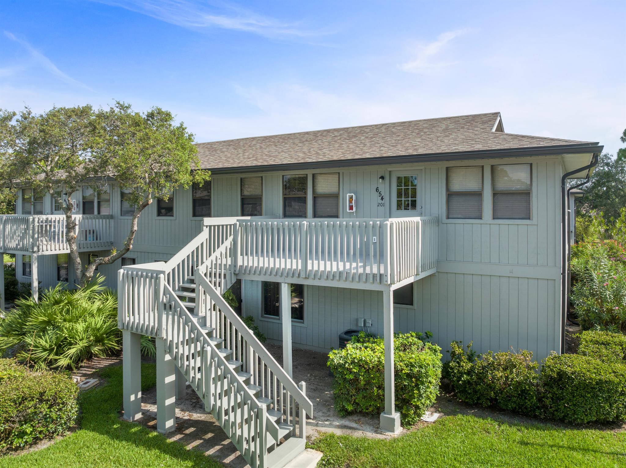 Welcome to this beautifully maintained 2-bedroom, 2-bath condo in the desirable Timber Ridge community of Vero Beach. Located on the second floor, this light and bright unit features vaulted ceilings, updated bathroom vanities, fresh paint, and a spacious split-bedroom layout--each with generous closet space and its own full bath. The unit is in excellent shape and includes in-unit laundry and a private balcony. Currently tenant-occupied through October and generating $1,775 per month, this property makes for a strong investment opportunity. Community amenities include optional access to tennis, pickleball, fitness facilities, and a sparkling pool. With a prime location just minutes from beaches, dining, and shopping, this move-in ready condo offers both comfort and cash flow.