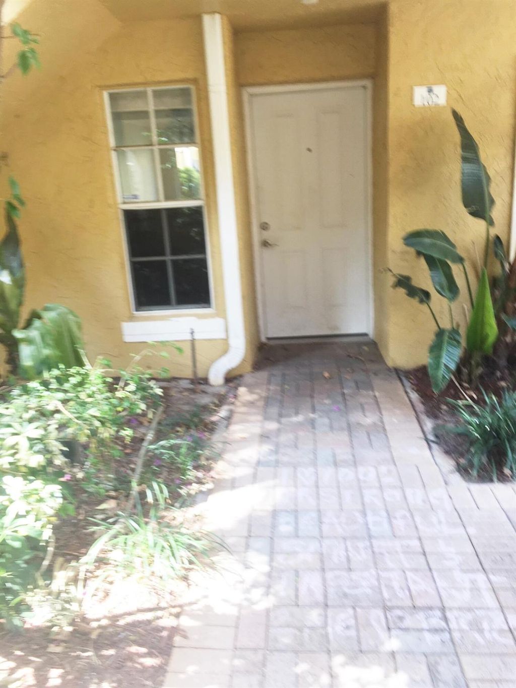 Photo of 1115 Lake Shore Drive #102, Lake Park, FL 33403 (MLS # R10895803)