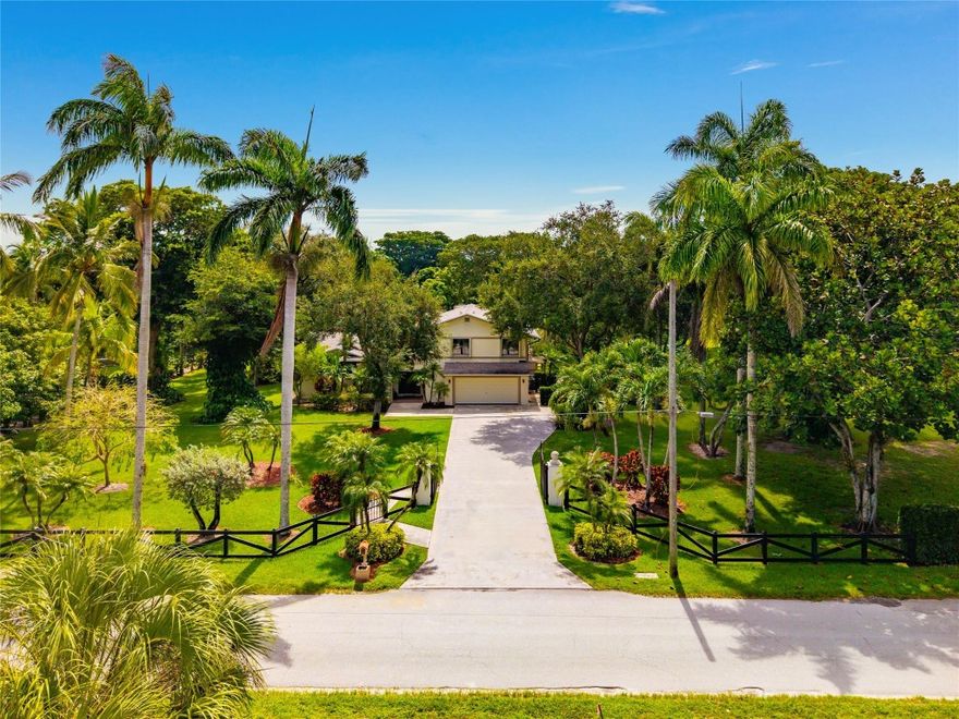 A perfect blend of peaceful country living and everyday convenience in this beautifully maintained 4/3 home, set on 2.5 acres of lush, landscaped grounds with mature fruit trees and open green space. This private retreat offers tranquility just minutes from top-rated schools, shopping, and dining. Ideally located only a quarter-mile from Barkland Dog Park and the Parkland Equestrian Center. Note: on-premises stables are not included but negotiable in rental.  Spacious living areas with generous natural light, a well-appointed kitchen ideal for cooking and entertaining, and a seamless flow between indoor and outdoor living. Step outside to enjoy your own heated pool, perfect for relaxing or hosting friends year-round.  This Parkland gem offers comfort, charm, and a lifestyle you’ll love!