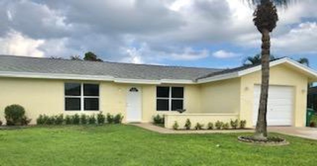 Photo of 2491 SE Sidonia Street, Port Saint Lucie, FL 34952 (MLS # R10743797)