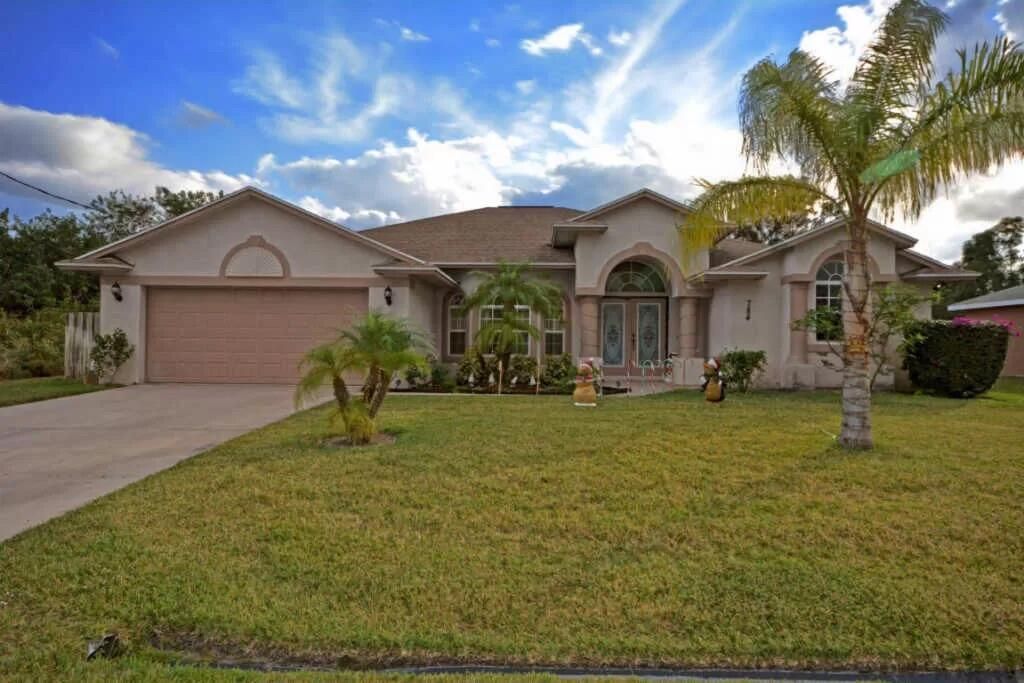 Photo of 784 SW Saragossa Avenue Ave, Port St Lucie, FL 34953 (MLS # R10766544)