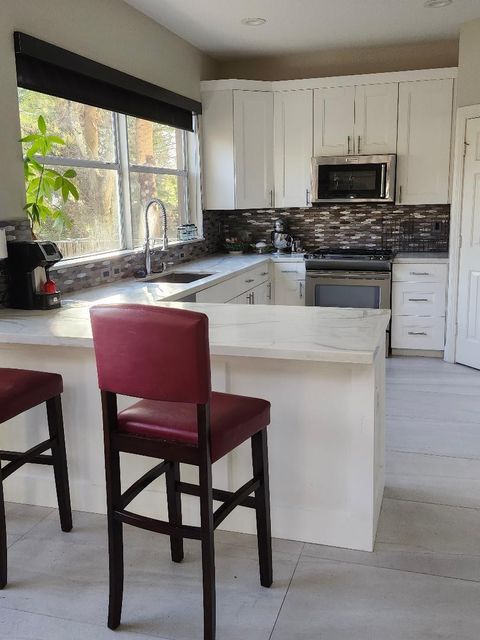 Tiny photo for 12410 SW 1st Street, Plantation, FL 33325 (MLS # F10549368)