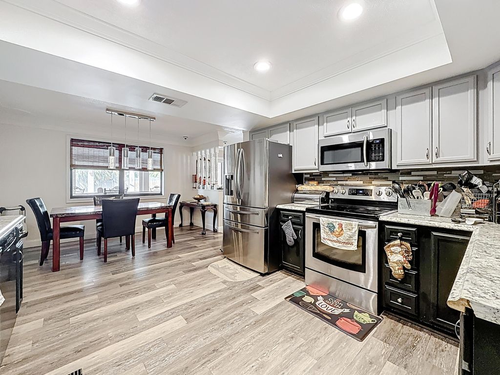 Photo of 189 NE Caprona Avenue, Port Saint Lucie, FL 34983 (MLS # R11157146)