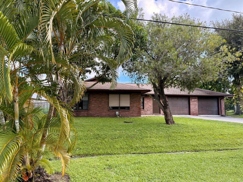 Photo of 2207 SE Avalon Road, Port Saint Lucie, FL 34952 (MLS # R11126347)