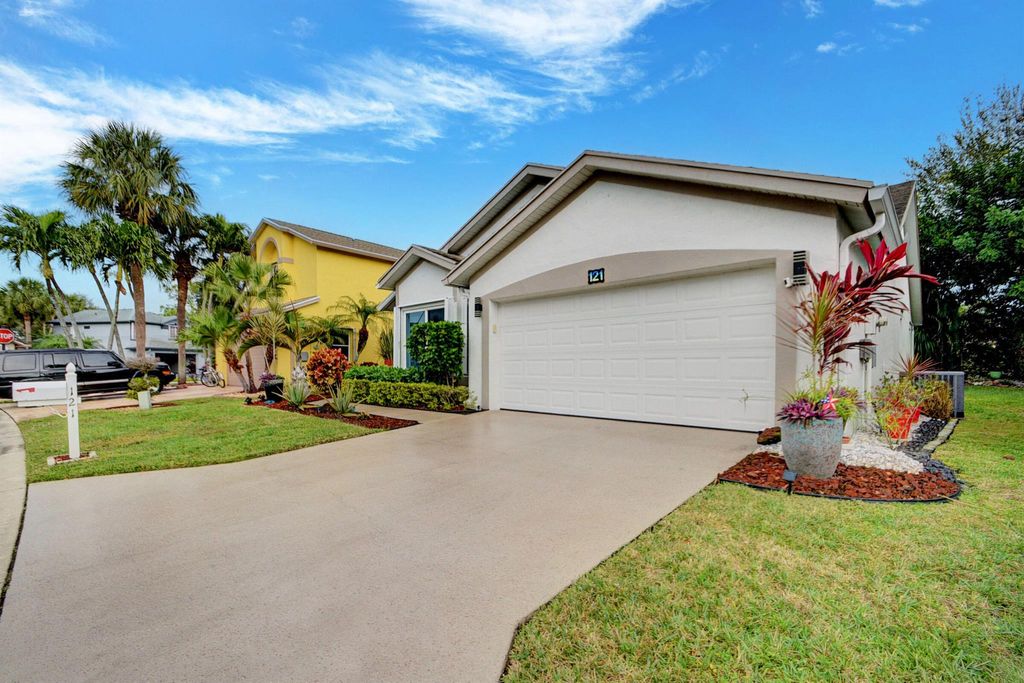 Photo of 121 Hammocks Drive, Greenacres, FL 33413 (MLS # R10957329)
