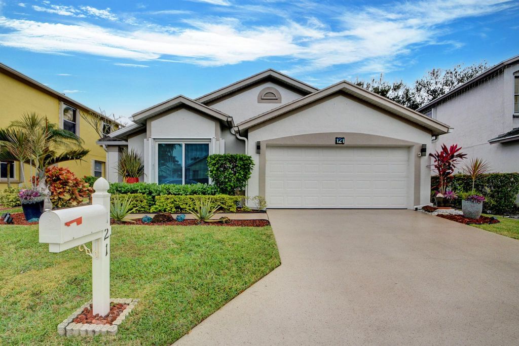 Photo of 121 Hammocks Drive, Greenacres, FL 33413 (MLS # R10957329)