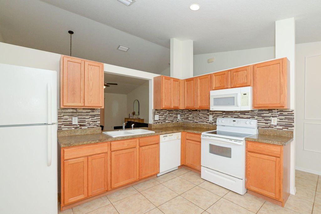 Photo of 885 SW Sultan Drive, Port Saint Lucie, FL 34953 (MLS # R11102317)