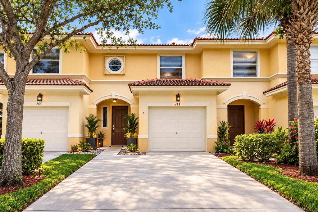 Photo of 211 River Bluff Lane, Royal Palm Beach, FL 33411 (MLS # B26079377)