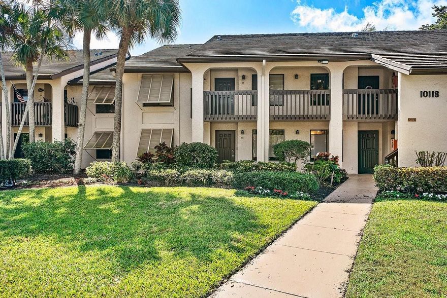 Welcome to this spacious first-floor condo featuring 2 bedrooms and 2 full bathrooms in a highly desirable 55+ community. The functional layout offers comfortable living areas, generous bedroom sizes, and ample storage throughout. The primary suite includes a large walk-in closet and an ensuite bathroom designed with accessibility in mind, while the second bathroom is conveniently located for guests. Located in the heart of Banyan Springs in Boynton Beach, residents enjoy an active lifestyle with resort-style amenities including pickleball, tennis, bocce ball, a clubhouse café, a full calendar of social events, and a relaxing main pool.