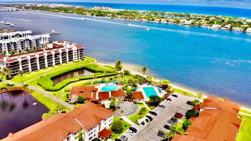 Beautiful 3BR Palm Beach County penthouse with water views in a gated Intracoastal community,heltering term seller financing is available for qualified buyers! This top-floor residence offers bright open living spaces,  large balcony, and relaxing water and garden views with refreshing breezes.Half Moon Bay Hypoluxo is a premier waterfront community with a true resort-style ambiance. Enjoy two heated pools, a hot tub, saunas, tennis courts, a bocce court, a waterfront promenade, lounge deck, and a charming gazebo overlooking the Intracoastal. The clubhouse offers inviting indoor spaces and hosts a variety of community events.