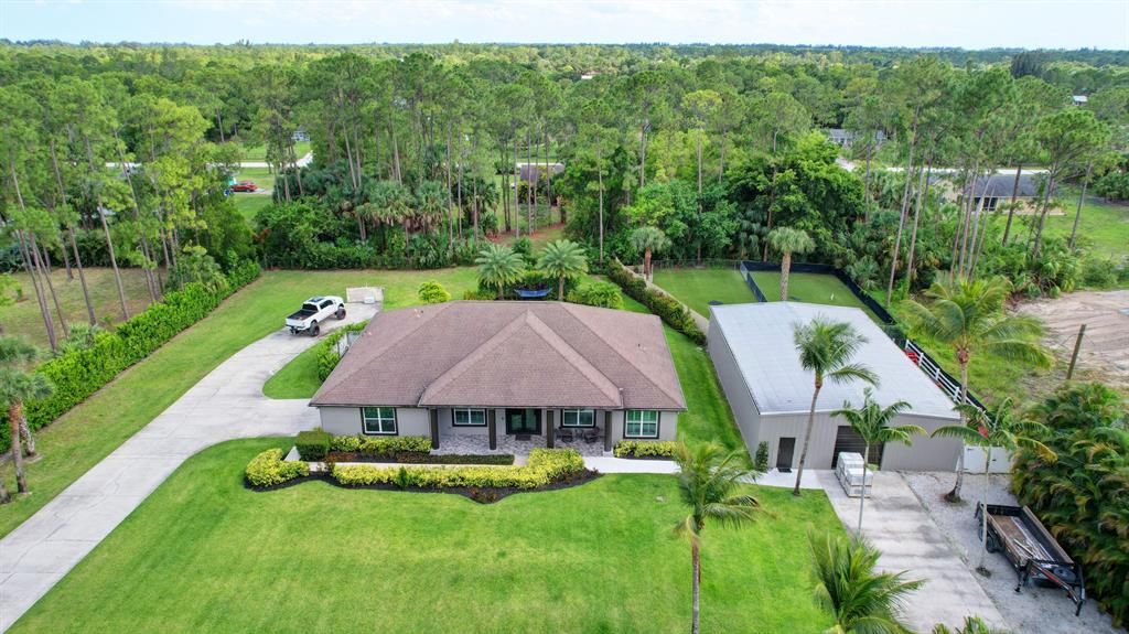 Photo of 14914 77th Place N, Loxahatchee, FL 33470 (MLS # R10889138)