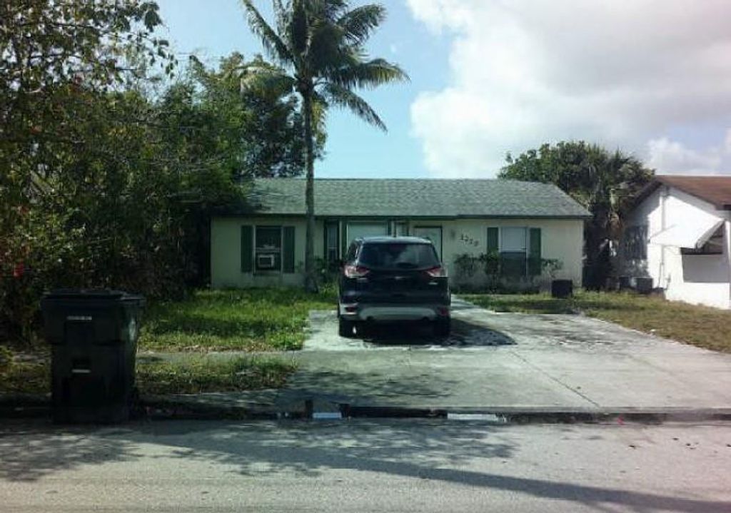 Photo of 1229 18th Avenue, Lake Worth Beach, FL 33460 (MLS # F10500314)