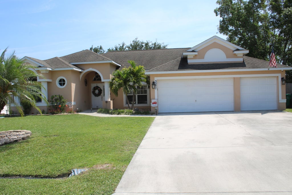 Photo of 5247 NW Gamma Street St, Port St Lucie, FL 34986 (MLS # R10797889)
