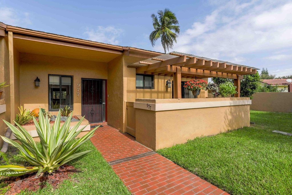 Photo of 977 NW 79th Terrace, Plantation, FL 33324 (MLS # R10945790)