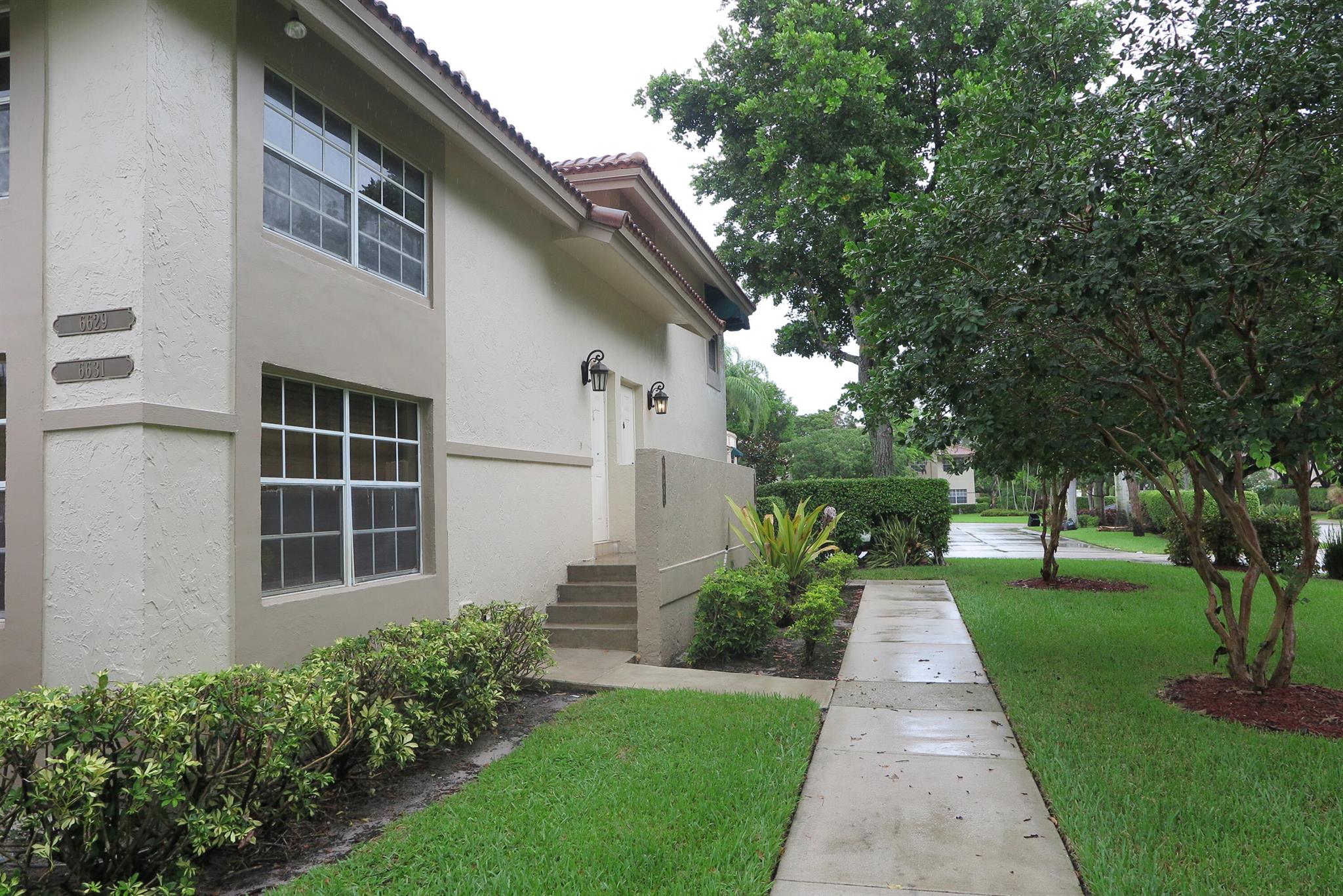 Lovely end unit townhome with 3 bedrooms upstairs. Excellent condition. Patio area has been enclosed to create additional living space. Updated kitchen with stainless appliances and granite counter tops. Tile floors throughout lower level. Close to community pool.