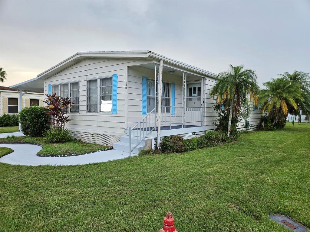 Photo of 180 Camino Del Rio, Port Saint Lucie, FL 34952 (MLS # R10908833)