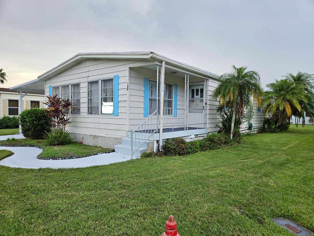 Photo of 180 Camino Del Rio, Port Saint Lucie, FL 34952 (MLS # R10908833)