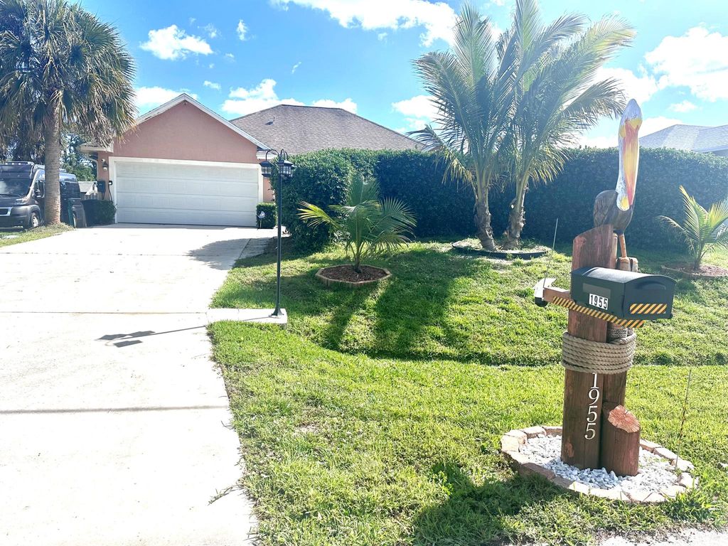 Photo of 1955 SW Castinet Lane W, Port Saint Lucie, FL 34953 (MLS # R10991242)