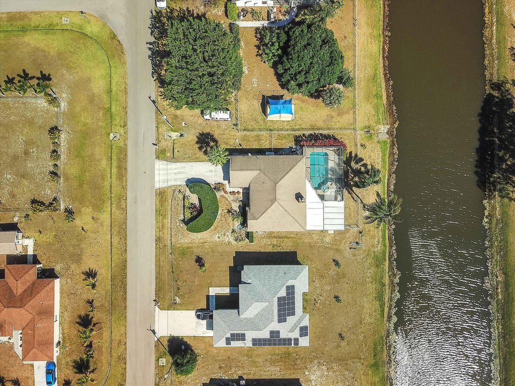 Photo of 1955 SW Castinet Lane W, Port Saint Lucie, FL 34953 (MLS # R10991242)