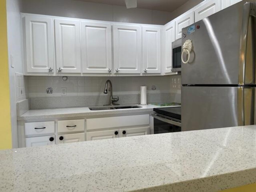 Photo of 2960 Lake Osborne Drive #107, Lake Worth Beach, FL 33461 (MLS # B26023904)