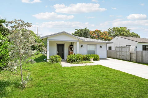 Photo of 945 32ND Street, West Palm Beach, FL 33407 (MLS # B26064732)