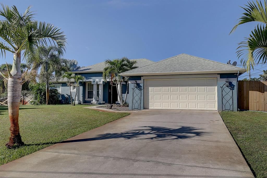 Photo of 4098 SW Hainlin Street, Port Saint Lucie, FL 34953 (MLS # R10762347)