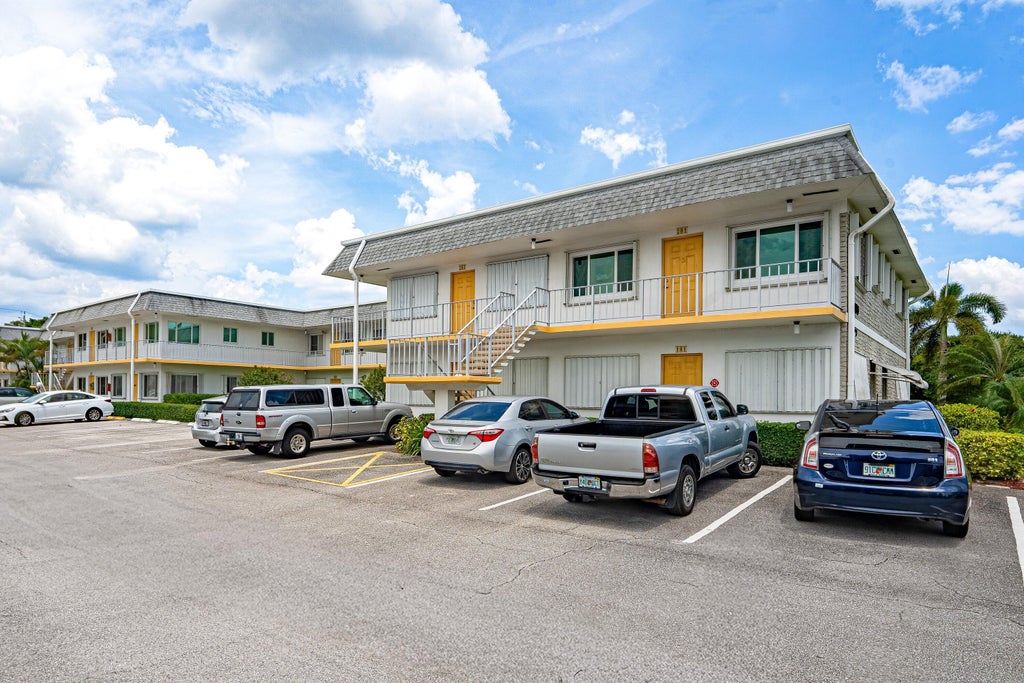 Photo of 3120 LAKE OSBORNE Drive #Bldg 7 Apt106, Lake Worth Beach, FL 33461 (MLS # B26058607)