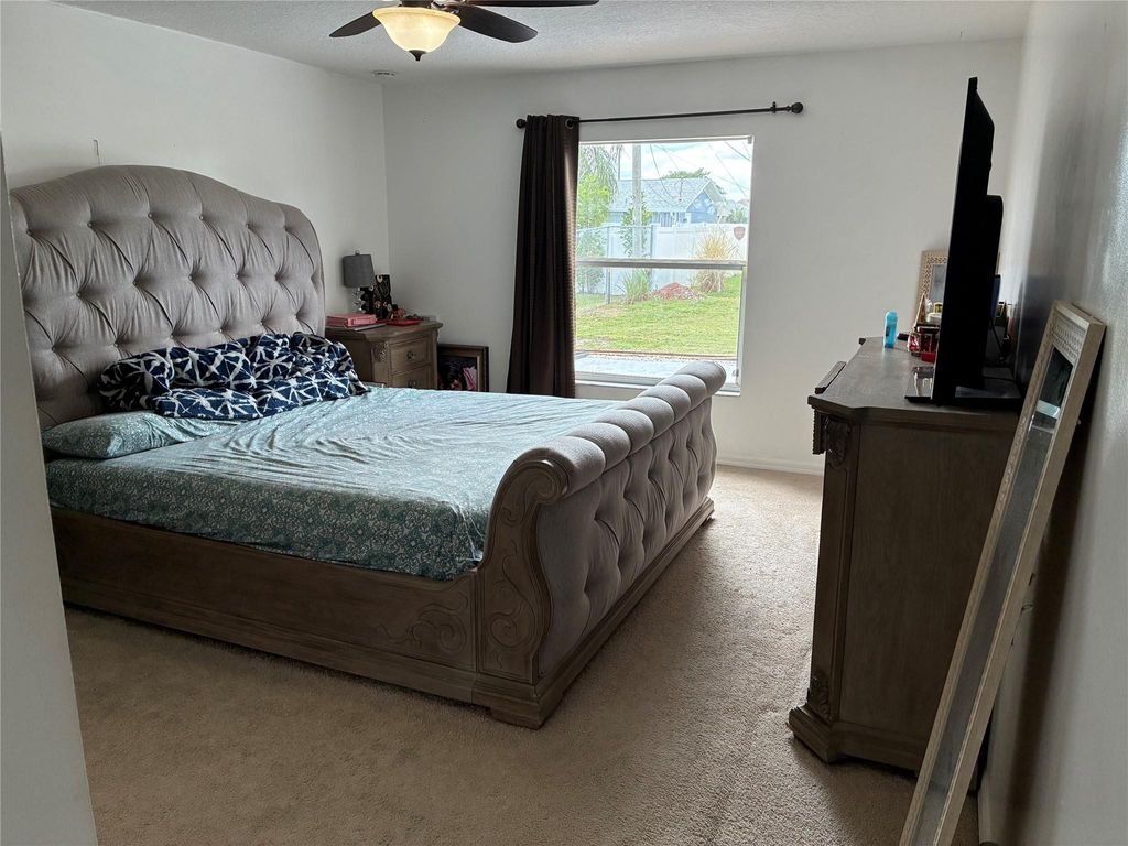 Photo of 602 SW Kenyoun Street, Port Saint Lucie, FL 34983 (MLS # B26009975)