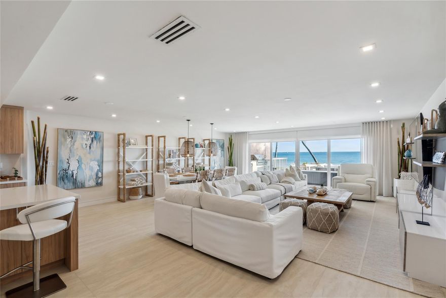 Welcome to your 4Bedroom, 3Bath, 2,840 SqFt Beachfront Paradise! Unique in its proximity to the sand! Having recently undergone a 'Down to the Studs' Renovation, this home is a remarkable find, unparalleled in the market for years. The luxurious master suite boasts dual sinks & closets, and a strategically placed tub for ocean views. Being one of only 6 units east of A1A, the features include: 2023 impact windows & doors, new roof, AC, electrical, & plumbing. Extras like an outdoor grill, shower, fridge, billiard table and a 23x15 ft awning only enhance the lifestyle. W/ 2 garage spaces, you can move from car to bedroom to beach with no stairs. Located in the coveted Hillsboro Beach area this property offers an unrivaled lifestyle in a market where such offerings are rare!