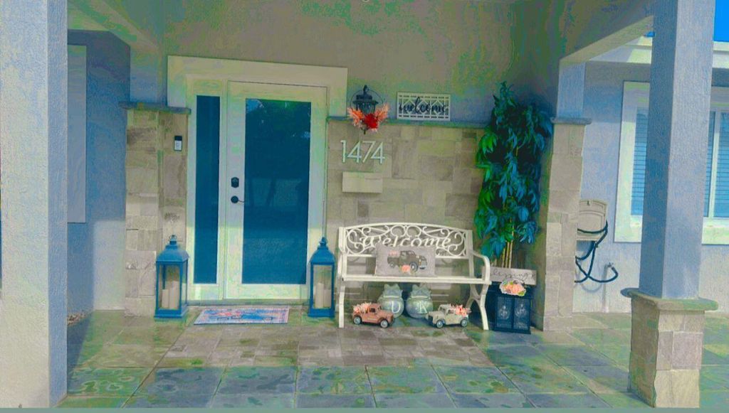 Photo of 1474 Cochran Drive, Lake Worth, FL 33461 (MLS # R11133942)