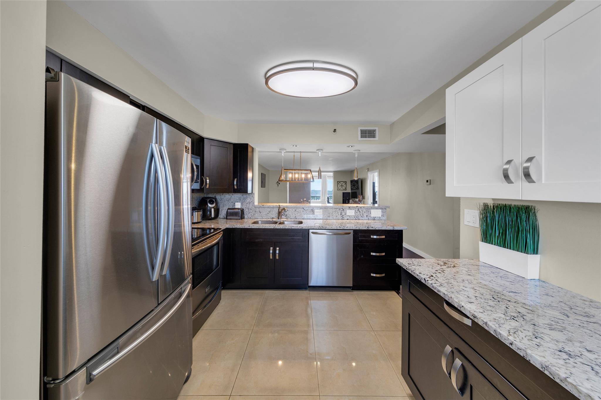 Welcome to your spacious top-floor retreat in the heart of Deerfield Beach! This bright and airy 2BR/2BA unit features a large split floorplan, abundant natural light, and generous storage throughout. Enjoy peace and privacy with no one above you and top floor views. This well-maintained building offers ample parking and is centrally located near shops, dining, and major highways. Building is well maintained and has reserves. This move-in ready condo offers comfort, convenience, and value. Don’t miss it!
