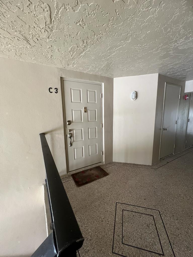 Photo of 712 Sunny Pine Way #C3, Greenacres, FL 33415 (MLS # B26068608)