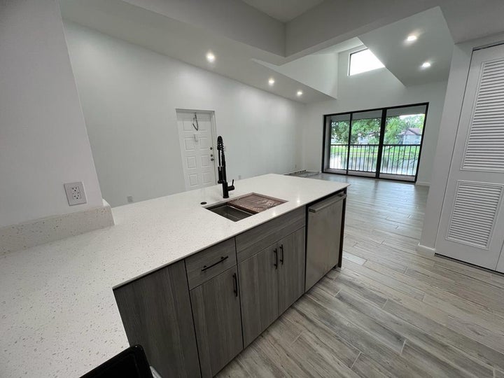 Photo 1 of 25 — 712 Sunny Pine Way C3, Greenacres, FL 33415