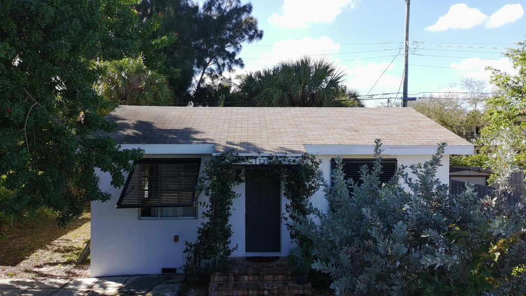Photo of 1115 S M Street, Lake Worth Beach, FL 33460 (MLS # B26011461)