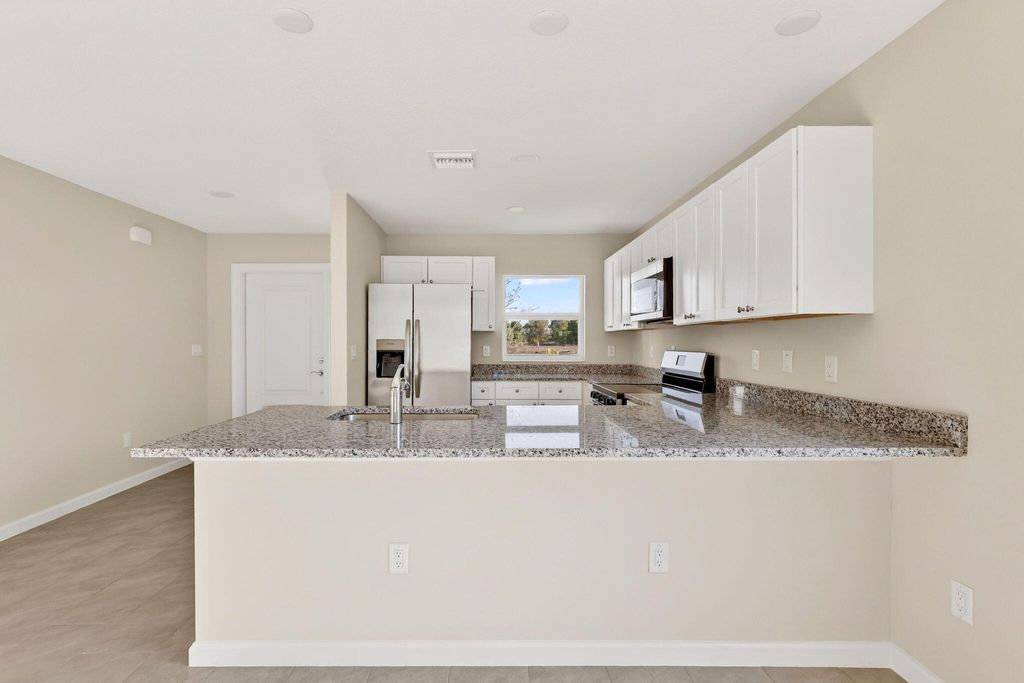 Photo of 138 SW Seminole Crossing Court, Indiantown, FL 34956 (MLS # R11126012)