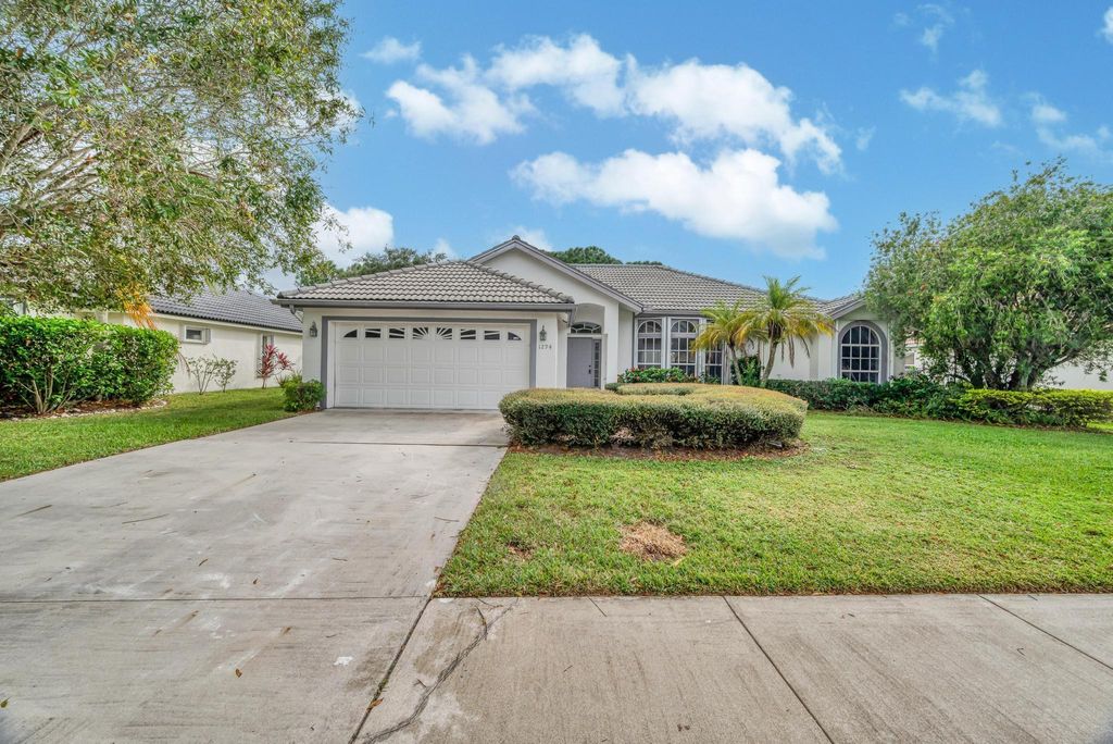 Photo of 1294 SW Briarwood Drive, Port Saint Lucie, FL 34986 (MLS # R11086084)