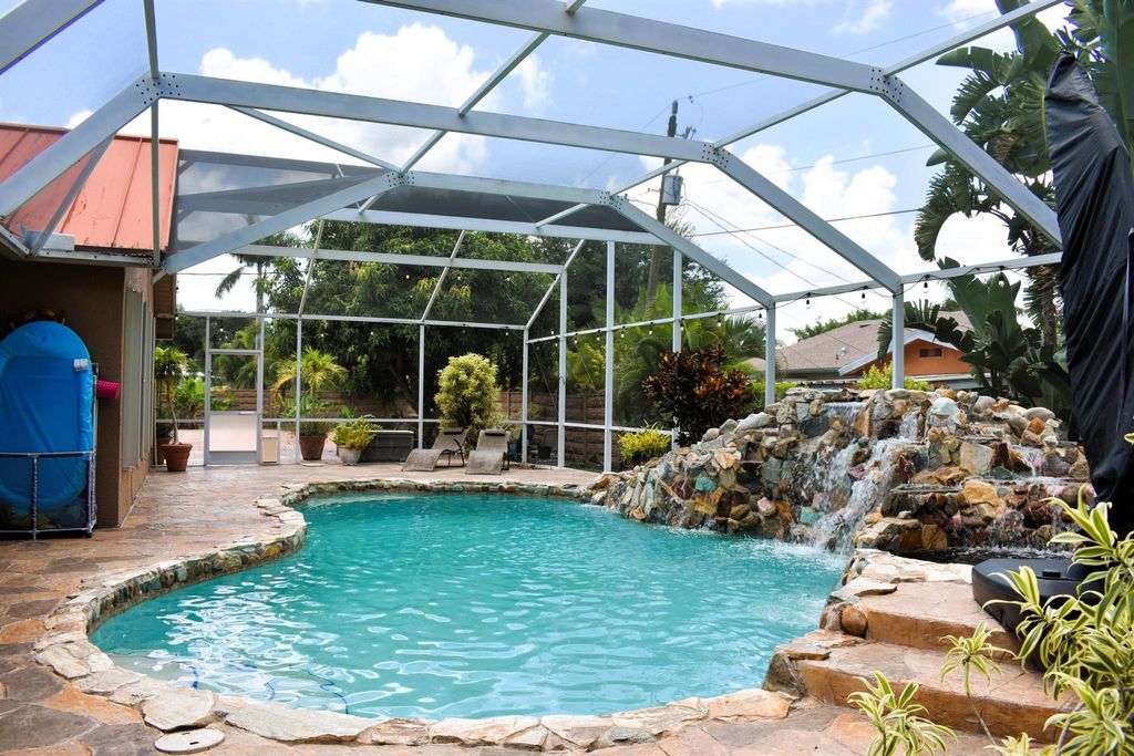 Photo of 1652 SW Schleicher Lane, Port Saint Lucie, FL 34984 (MLS # R11112658)