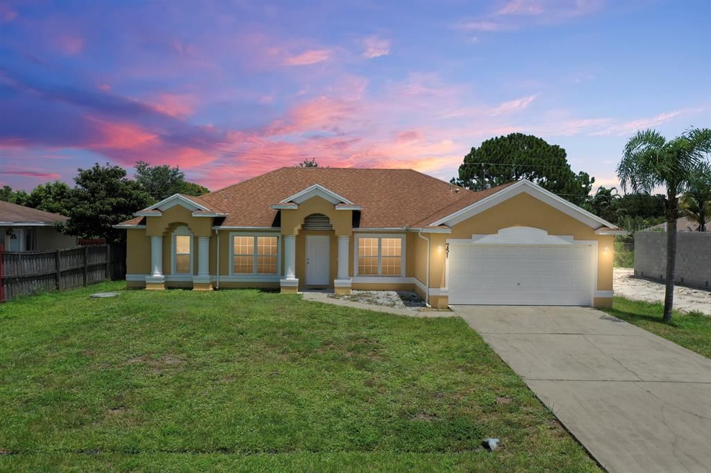 Photo of 751 SW Dolores Avenue, Port Saint Lucie, FL 34983 (MLS # R10732757)